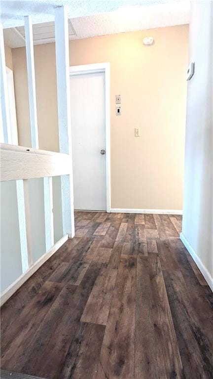8476 Lane Dr, Raytown, MO 64138 - hallway with hardwood / wood-style floors