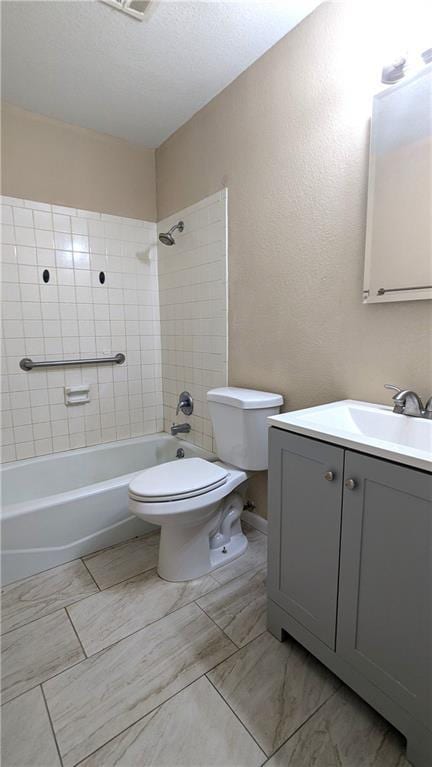 8476 Lane Dr, Raytown, MO 64138 - bathroom featuring vanity,  shower combination, and a textured wall