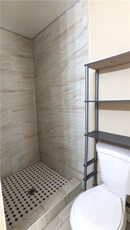 8476 Lane Dr, Raytown, MO 64138 - bathroom featuring a stall shower and toilet
