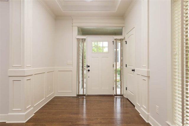 8558 Barstow St, Lenexa, KS 66219 - entryway featuring a decorative wall, dark wood-style flooring, crown molding, and wainscoting