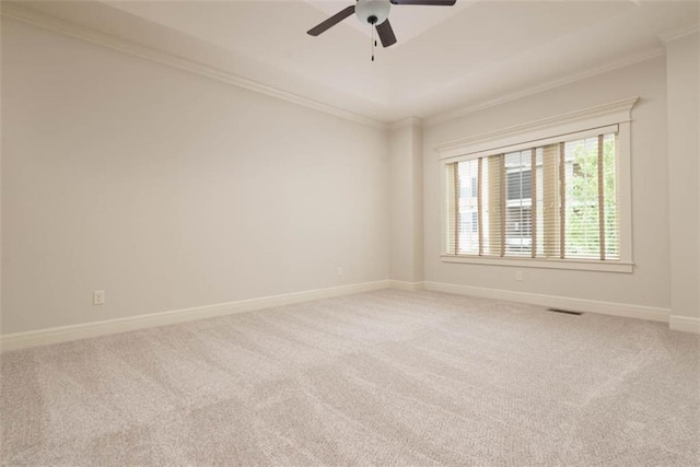 8558 Barstow St, Lenexa, KS 66219 - spare room with crown molding, light colored carpet, and a ceiling fan