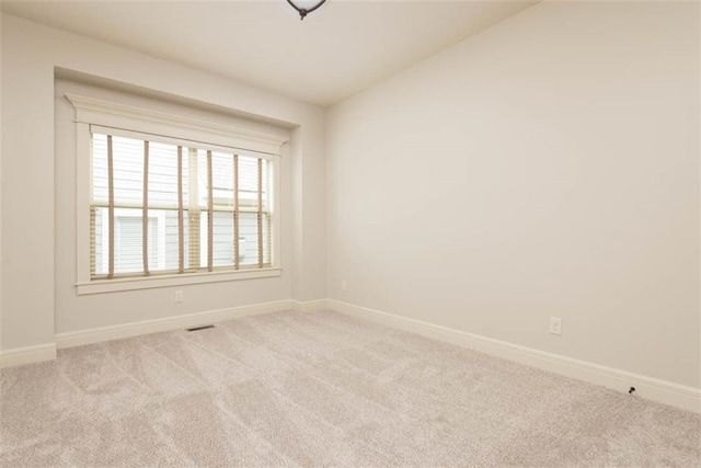 8558 Barstow St, Lenexa, KS 66219 - carpeted spare room with baseboards
