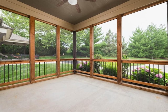 8558 Barstow St, Lenexa, KS 66219 - unfurnished sunroom featuring a ceiling fan and carpet
