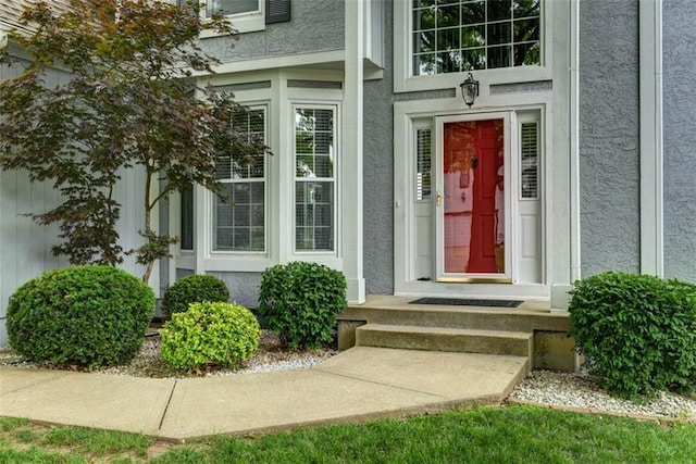 16533 W 80th St, Lenexa, KS 66219 - view of exterior entry featuring stucco siding