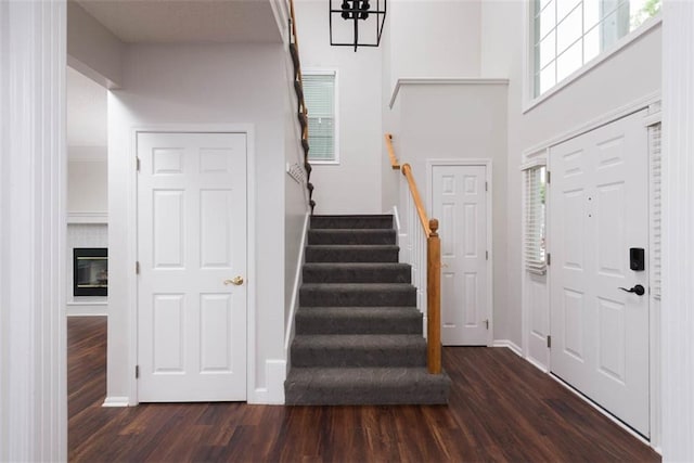 16533 W 80th St, Lenexa, KS 66219 - entryway with dark wood finished floors, stairs, and plenty of natural light