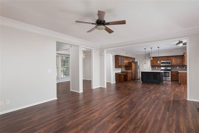 16533 W 80th St, Lenexa, KS 66219 - unfurnished living room featuring ceiling fan, dark wood-type flooring, and crown molding