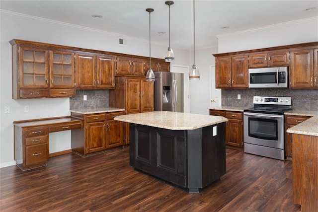 16533 W 80th St, Lenexa, KS 66219 - kitchen featuring appliances with stainless steel finishes, dark wood-style flooring, tasteful backsplash, hanging light fixtures, and light stone countertops