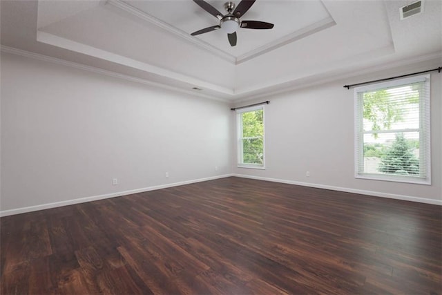 16533 W 80th St, Lenexa, KS 66219 - unfurnished room with a raised ceiling, a ceiling fan, dark wood finished floors, and crown molding