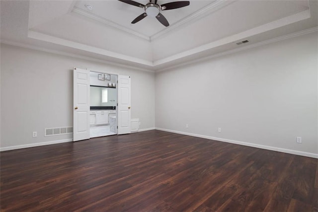 16533 W 80th St, Lenexa, KS 66219 - unfurnished room featuring a raised ceiling, ceiling fan, dark wood finished floors, and crown molding