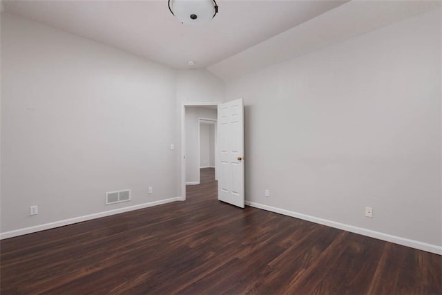 16533 W 80th St, Lenexa, KS 66219 - spare room with wood finished floors and vaulted ceiling