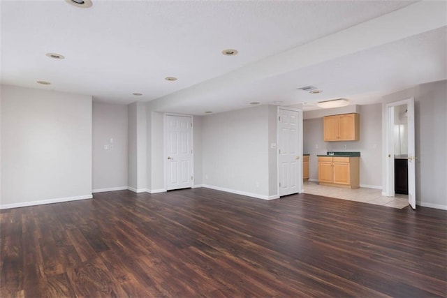 16533 W 80th St, Lenexa, KS 66219 - unfurnished living room with wood finished floors and recessed lighting