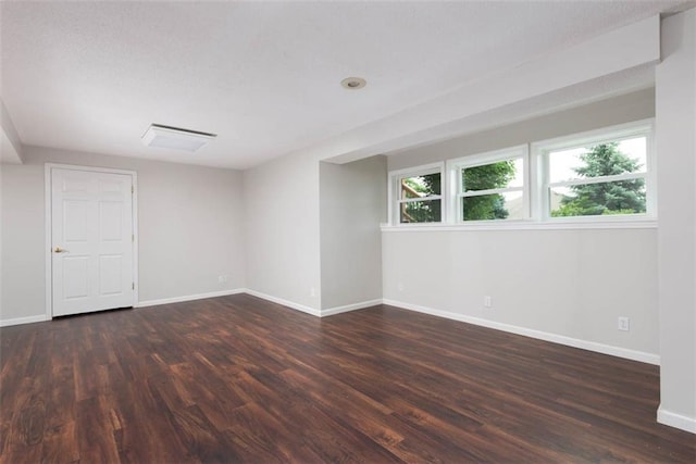 16533 W 80th St, Lenexa, KS 66219 - spare room with dark wood finished floors and baseboards