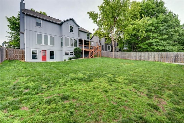 16533 W 80th St, Lenexa, KS 66219 - rear view of property with stairway, a fenced backyard, a wooden deck, and a chimney