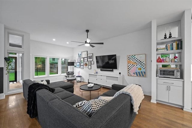 2711 W 49th St, Westwood, KS 66205 - living room featuring wood finished floors, a ceiling fan, recessed lighting, and baseboards