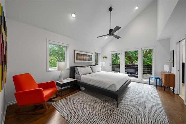 2711 W 49th St, Westwood, KS 66205 - bedroom featuring access to outside, dark wood-style floors, high vaulted ceiling, recessed lighting, and baseboards