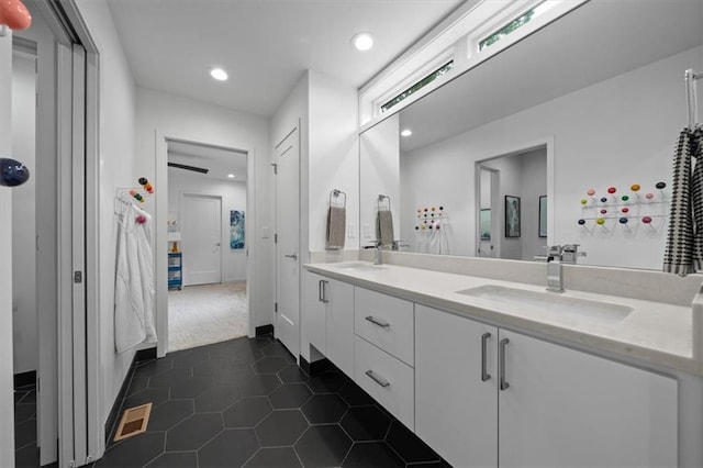 2711 W 49th St, Westwood, KS 66205 - full bath featuring double vanity, recessed lighting, and tile patterned floors