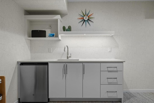 2711 W 49th St, Westwood, KS 66205 - kitchen with wallpapered walls, fridge, a sink, and baseboards