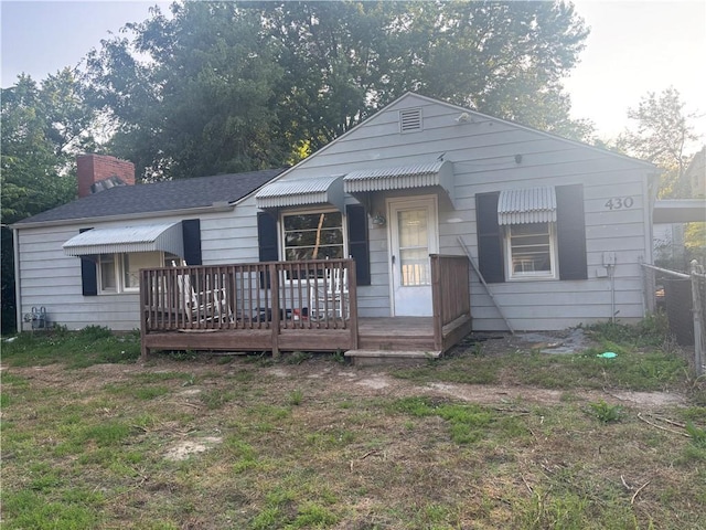 430 S 68th St, Kansas City, KS 66111 - view of front of house with a chimney