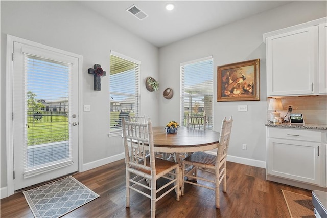7546 Mccormick Dr, Shawnee, KS 66227 - dining area with dark wood-type flooring and recessed lighting