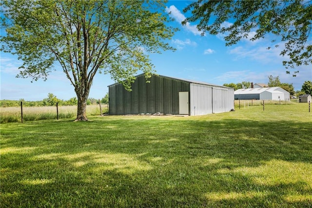630 Oo Hwy, Centerview, MO 64019 - view of grassy yard with a pole building and an outdoor structure