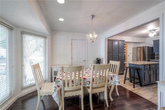 14001 S Tomahawk Dr, Olathe, KS 66062 - dining space featuring a chandelier, light wood-type flooring, and recessed lighting