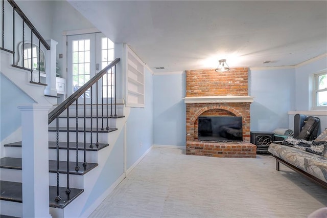 14001 S Tomahawk Dr, Olathe, KS 66062 - living area featuring ornamental molding, stairway, and a fireplace