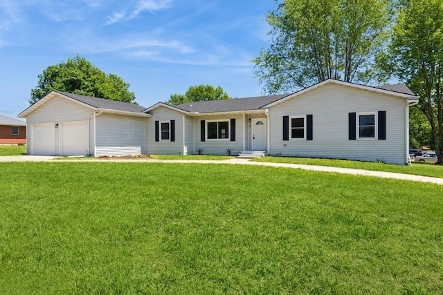 105 S W St, Concordia, MO 64020 - ranch-style home with a garage, a front lawn, and driveway