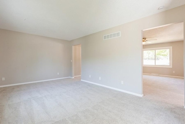 105 S W St, Concordia, MO 64020 - unfurnished room featuring carpet flooring and a ceiling fan