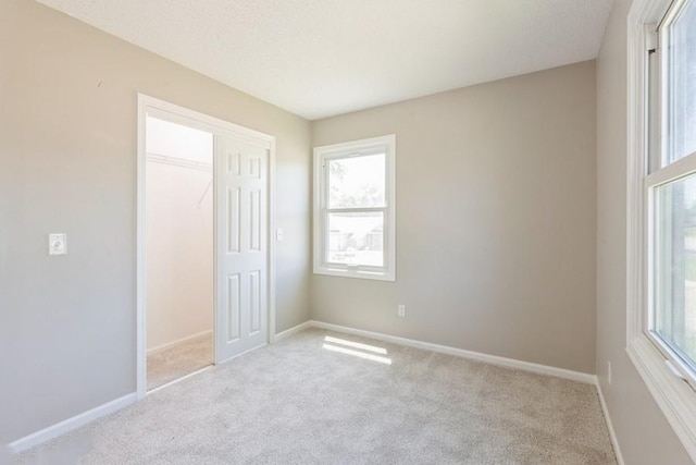 105 S W St, Concordia, MO 64020 - unfurnished bedroom with carpet flooring and a closet