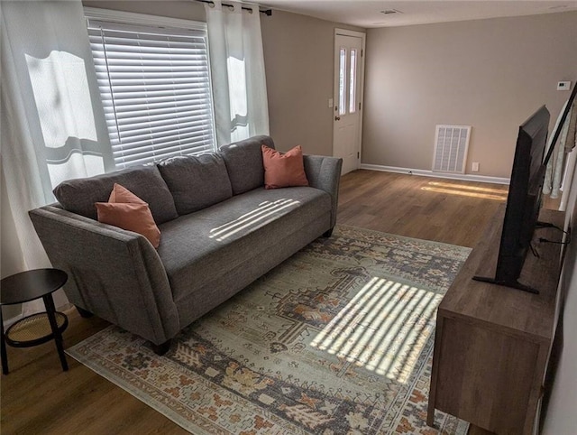 8804 E 47th St, Kansas City, MO 64129 - living area with wood finished floors and baseboards