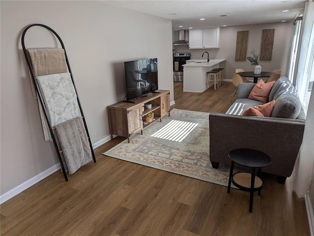 8804 E 47th St, Kansas City, MO 64129 - living area featuring wood finished floors and baseboards