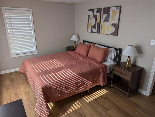 8804 E 47th St, Kansas City, MO 64129 - bedroom with wood finished floors and baseboards