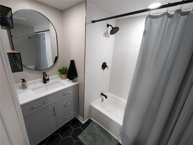 8804 E 47th St, Kansas City, MO 64129 - bathroom with vanity, tile patterned floors, and shower / tub combo
