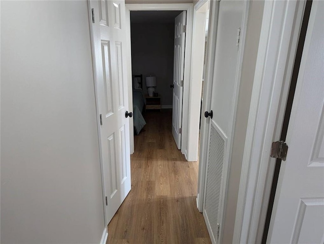 8804 E 47th St, Kansas City, MO 64129 - hall with wood finished floors and baseboards
