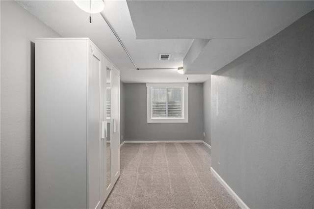 604 NE Ash St NE, Lees Summit, MO 64063 - corridor featuring carpet flooring, baseboards, and a textured wall