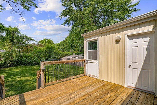 604 NE Ash St NE, Lees Summit, MO 64063 - deck featuring a lawn