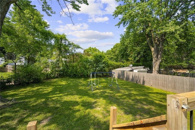 604 NE Ash St NE, Lees Summit, MO 64063 - view of yard featuring a playground