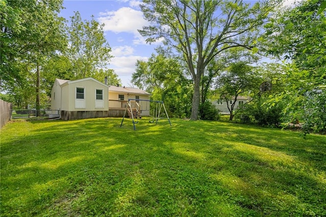 604 NE Ash St NE, Lees Summit, MO 64063 - view of yard with a playground
