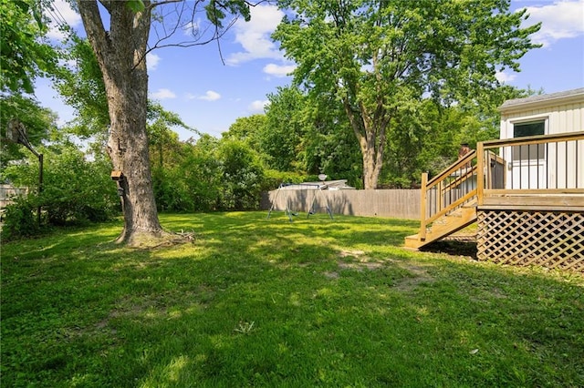 604 NE Ash St NE, Lees Summit, MO 64063 - view of yard featuring a deck and stairway