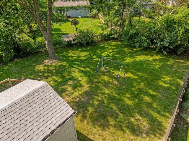 604 NE Ash St NE, Lees Summit, MO 64063 - view of green lawn with a wooden deck