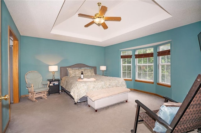 1229 SE Princeton Dr, Lees Summit, MO 64081 - bedroom with a raised ceiling, carpet floors, and ceiling fan