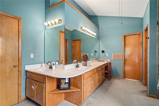 1229 SE Princeton Dr, Lees Summit, MO 64081 - bathroom featuring double vanity and baseboards