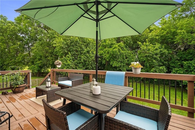 1229 SE Princeton Dr, Lees Summit, MO 64081 - deck featuring outdoor dining space and view of scattered trees