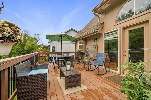 1229 SE Princeton Dr, Lees Summit, MO 64081 - wooden deck featuring outdoor dining area