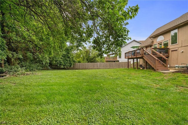 1229 SE Princeton Dr, Lees Summit, MO 64081 - view of yard featuring stairway and a wooden deck