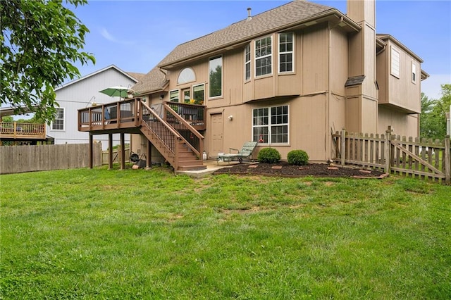 1229 SE Princeton Dr, Lees Summit, MO 64081 - rear view of house with a deck, a fenced backyard, stairs, and a chimney