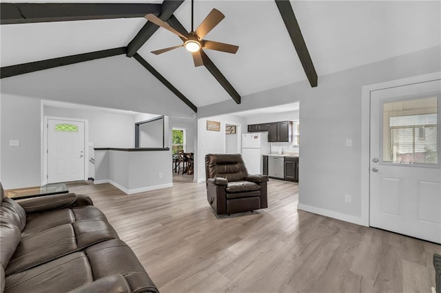 19133 E 15th St N, Independence, MO 64056 - living area with ceiling fan, baseboards, and light wood-style flooring