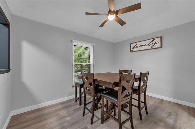 19133 E 15th St N, Independence, MO 64056 - dining area featuring wood finished floors, a ceiling fan, and baseboards