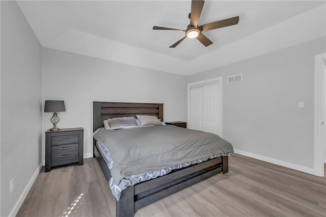 19133 E 15th St N, Independence, MO 64056 - bedroom with baseboards, wood finished floors, a closet, and ceiling fan