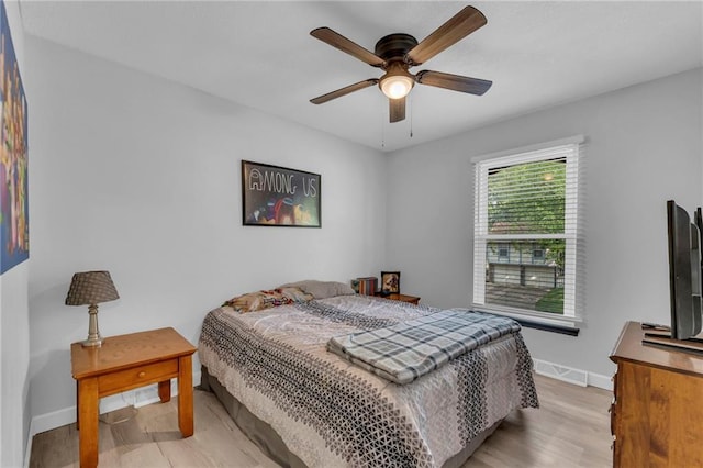 19133 E 15th St N, Independence, MO 64056 - bedroom featuring light wood-style floors, baseboards, and a ceiling fan